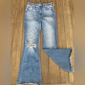 Flare jeans with rips